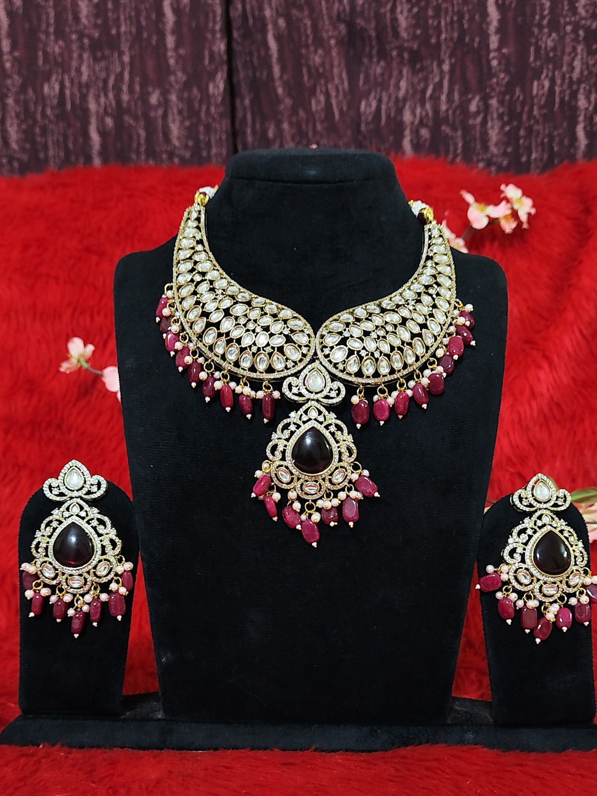 Bridal Kundan necklace set with red stone drops and gold tone finish