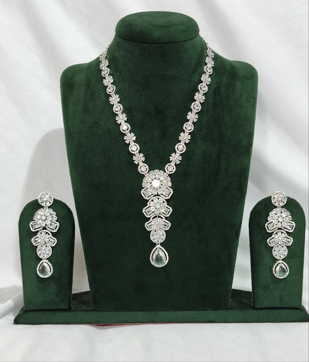 Radiant Floral American Diamond Long Necklace Set with Teardrop Pendant and Earrings