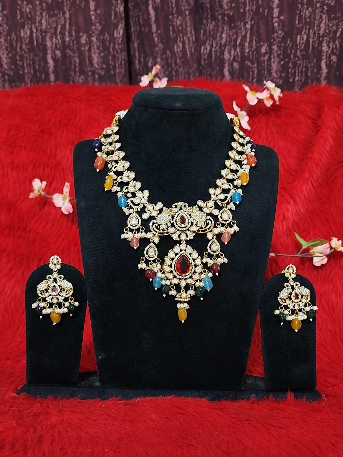 Kundan necklace set with multicolor stones and matching earrings