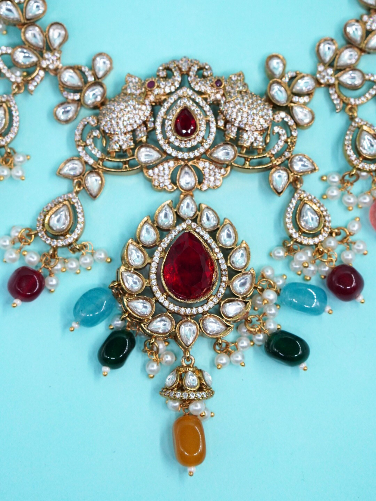 Kundan necklace set with multicolor stones close view