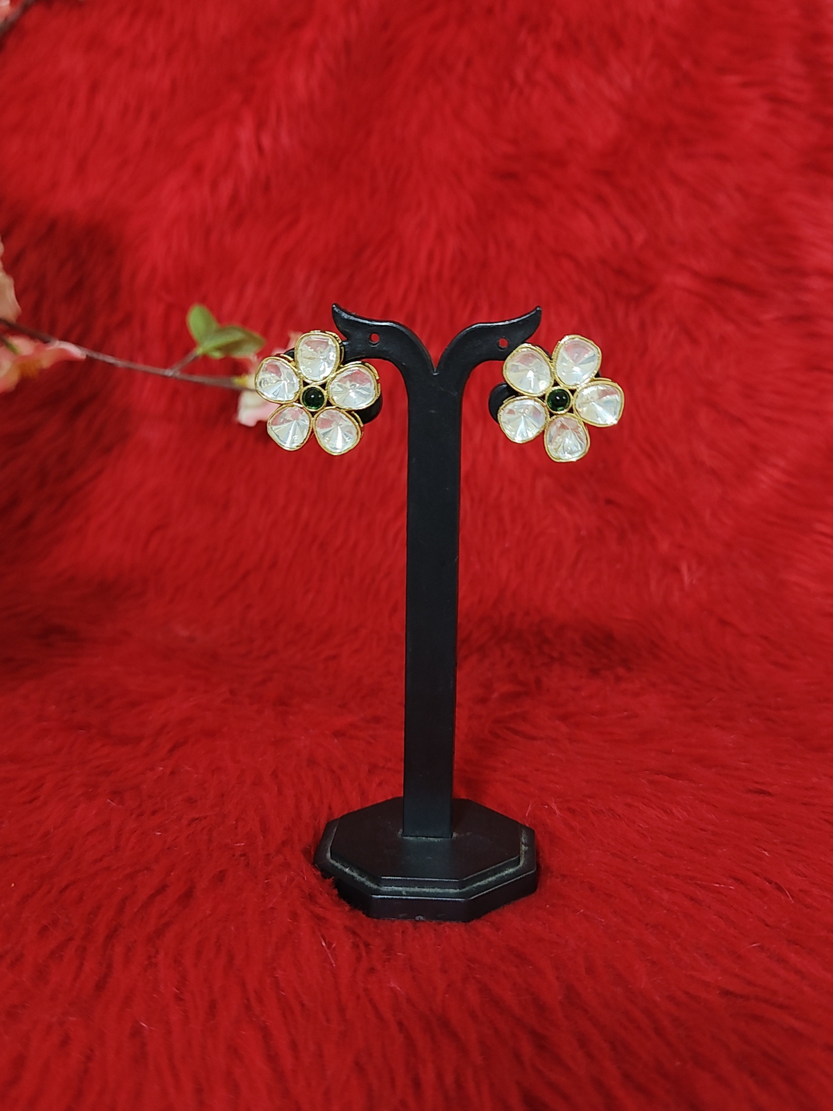 Moissanite floral earrings on stand