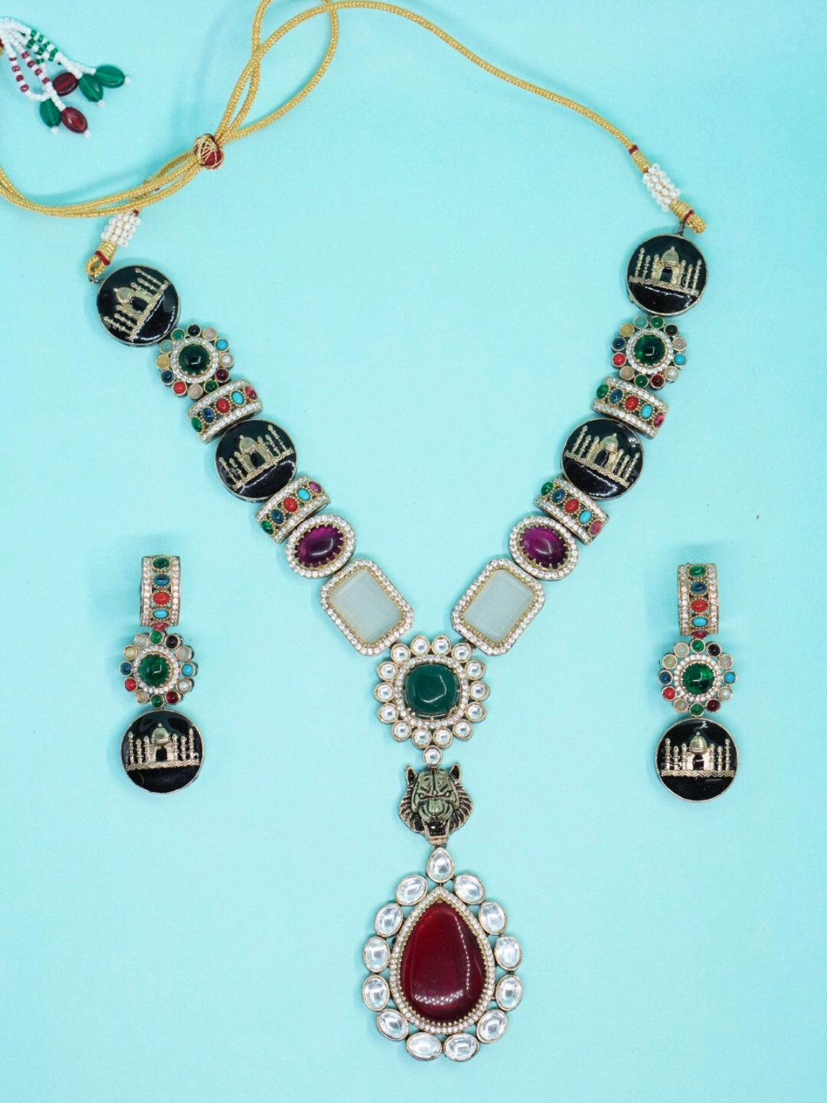 Sabyasachi style kundan stone necklace set with earrings and red drop pendant