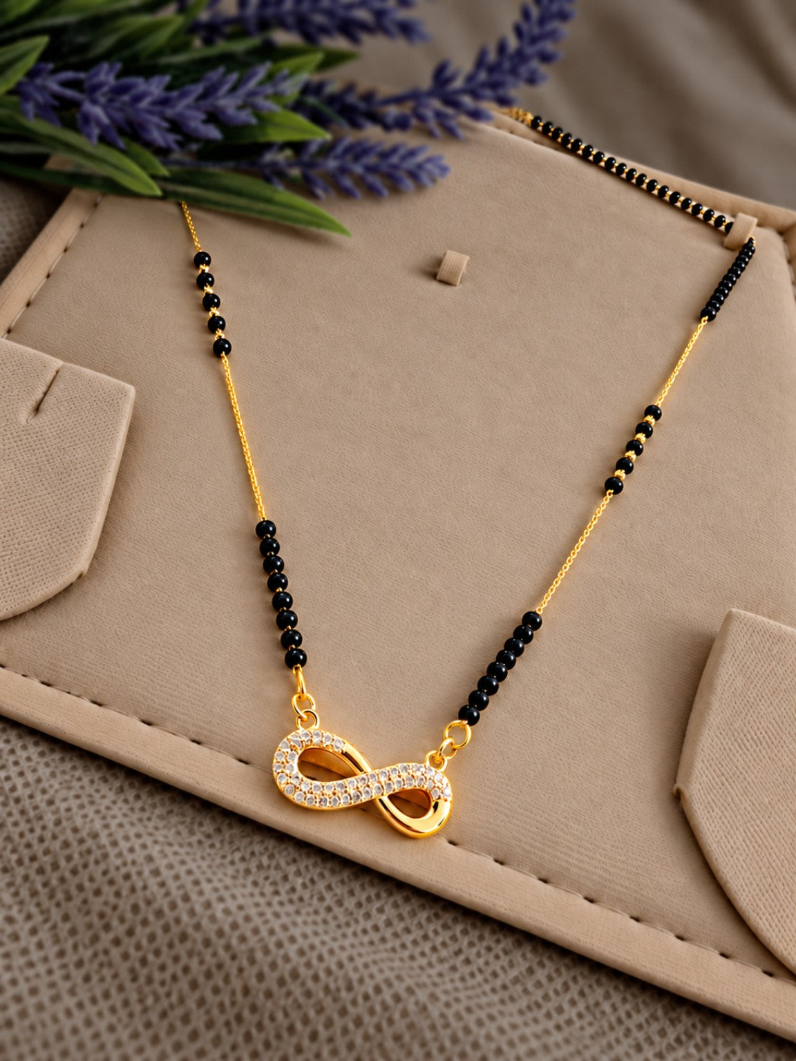 Micro gold-plated black bead mangalsutra with double loop stone pendant