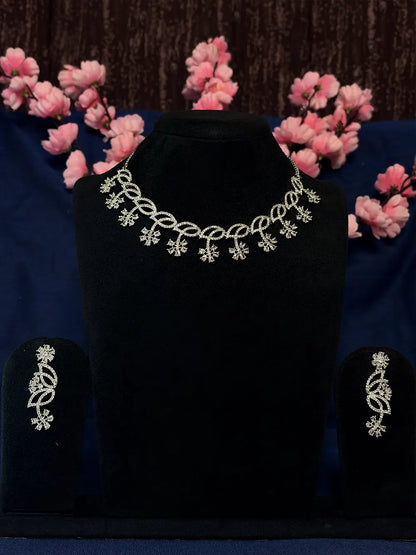 Silver White American Diamond Twisted Loop & Snowflake Necklace Set with Dangler Earrings