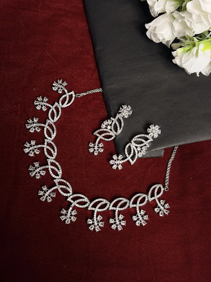 Silver White American Diamond Twisted Loop & Snowflake Necklace Set with Dangler Earrings
