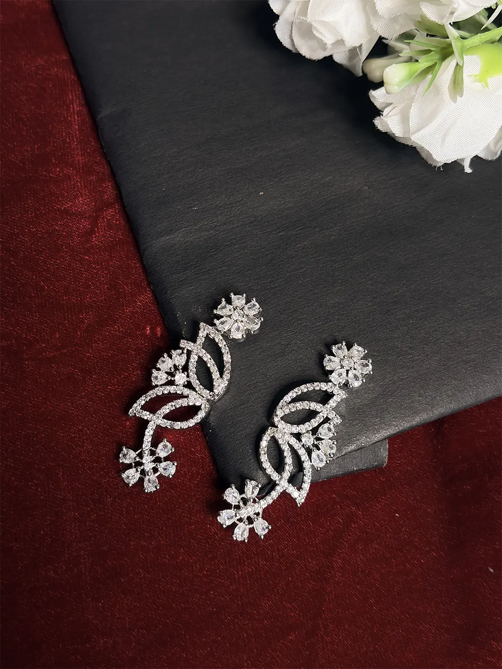 Silver White American Diamond Twisted Loop & Snowflake Necklace Set with Dangler Earrings