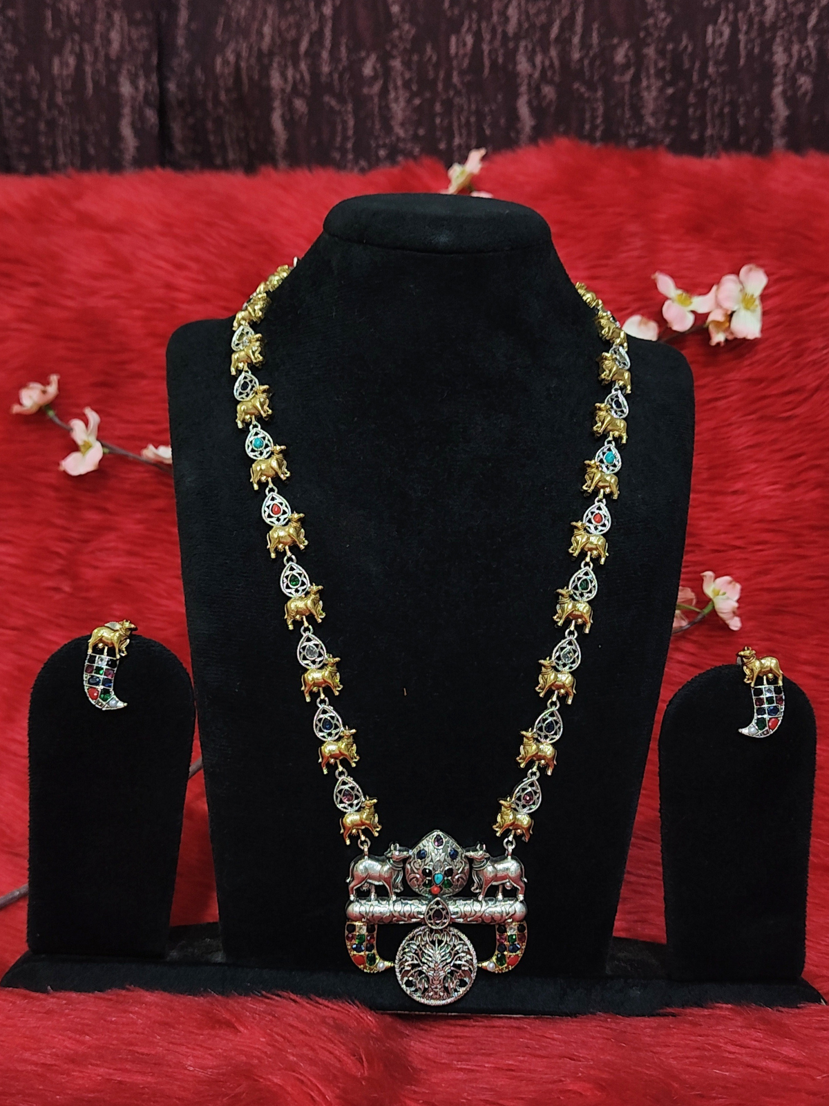 Silver replica long temple necklace with antique finish and cow motifs