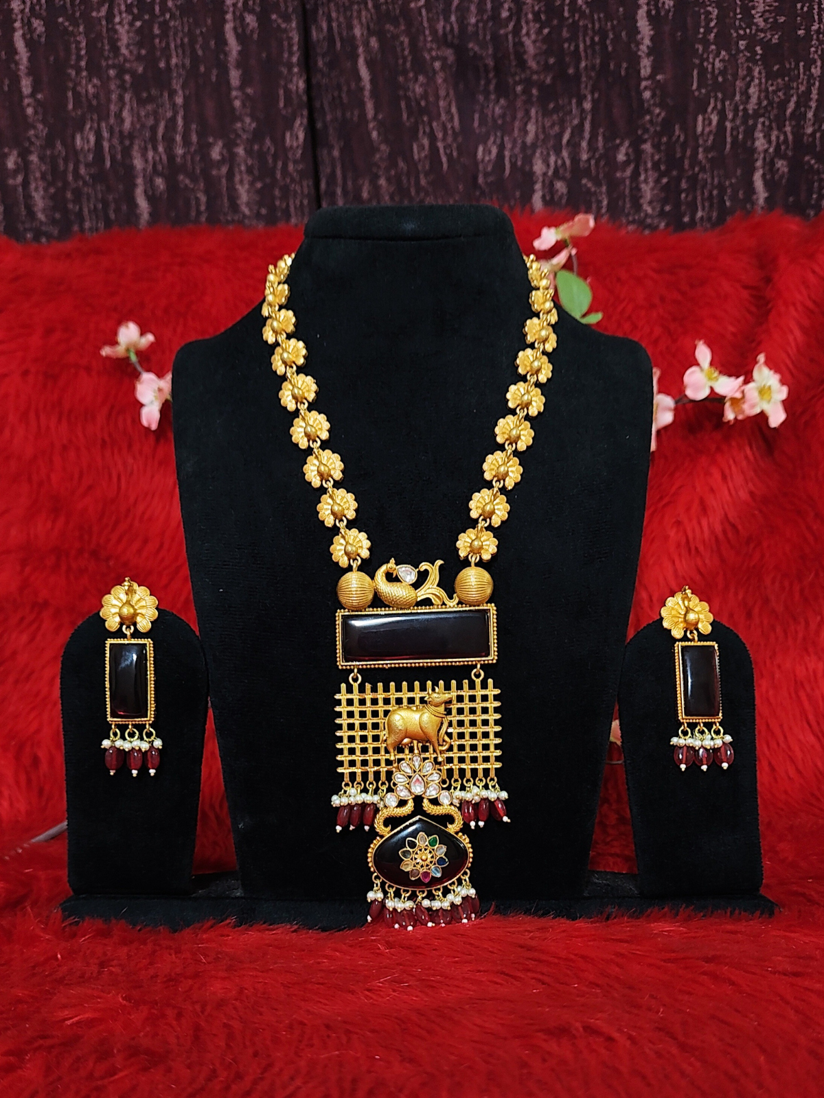 Apala Long State red stone temple necklace set with cow motif and matching earrings 