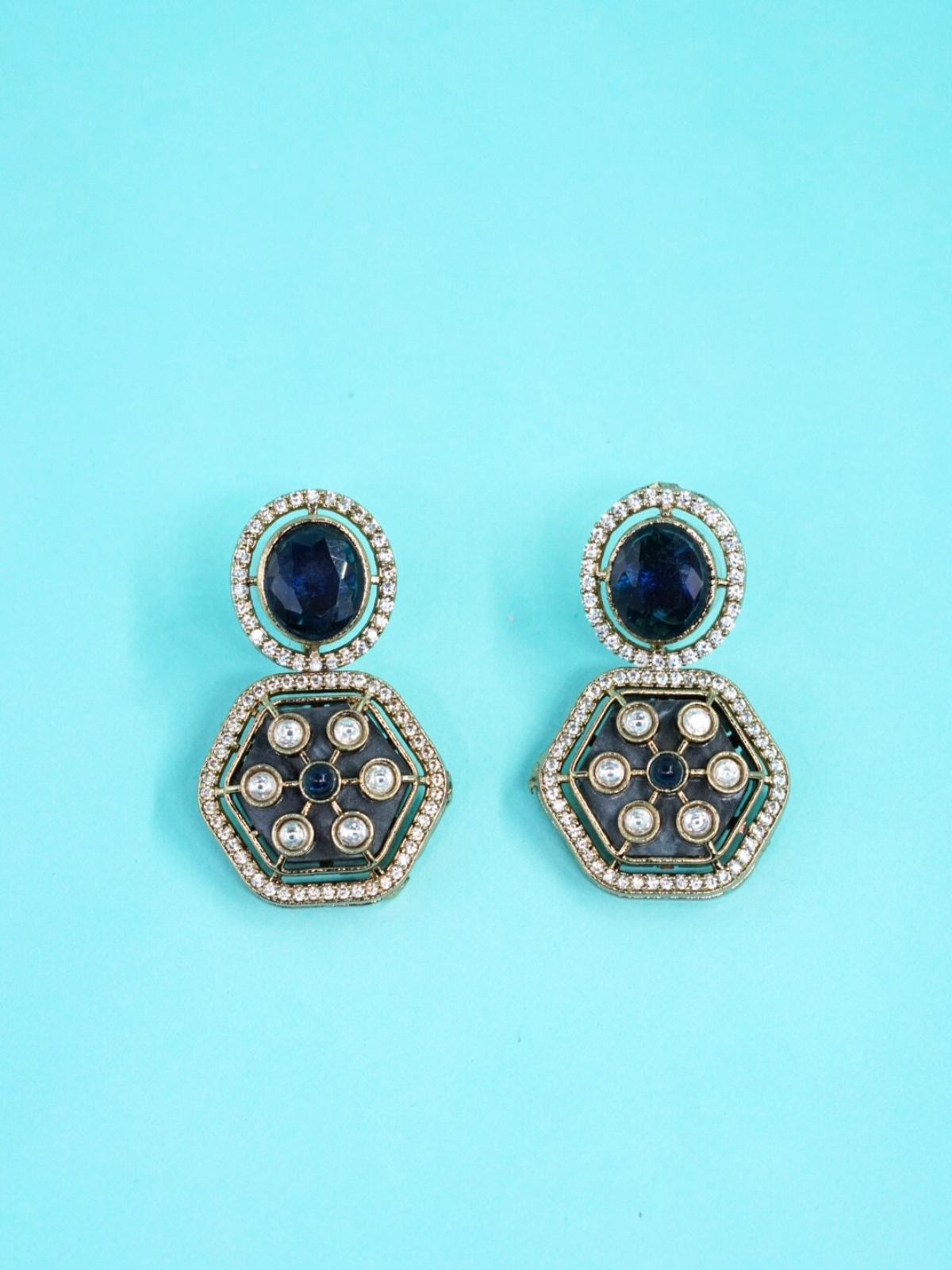 Beautiful Moissanite Earrings with blue and white stone