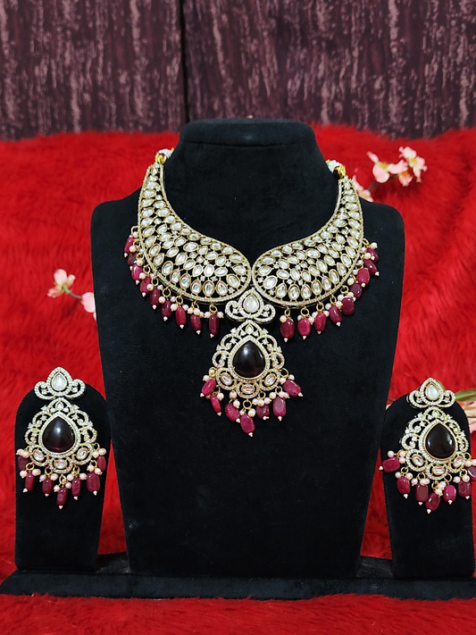 Bridal Kundan necklace set with red stone drops and gold tone finish