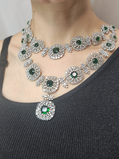 Grand American Diamond bridal necklace set with circular design and emerald green accents – matching earrings included