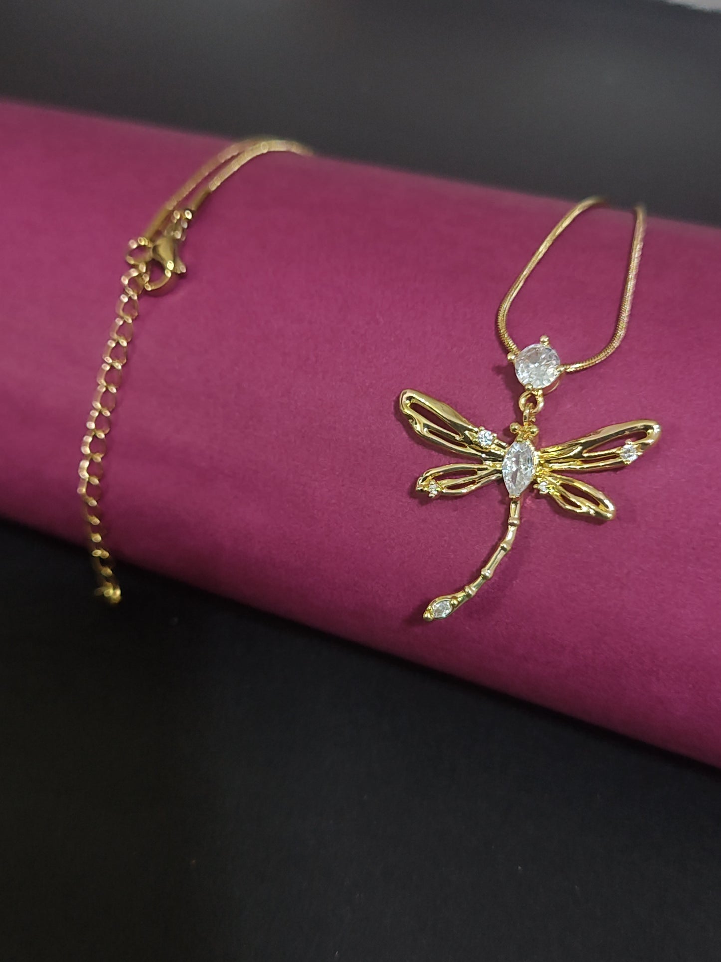 Anti-tarnish dragonfly charm necklace with sparkling stones.