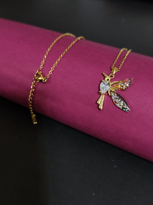 Anti-tarnish hummingbird charm necklace with colorful stone details.