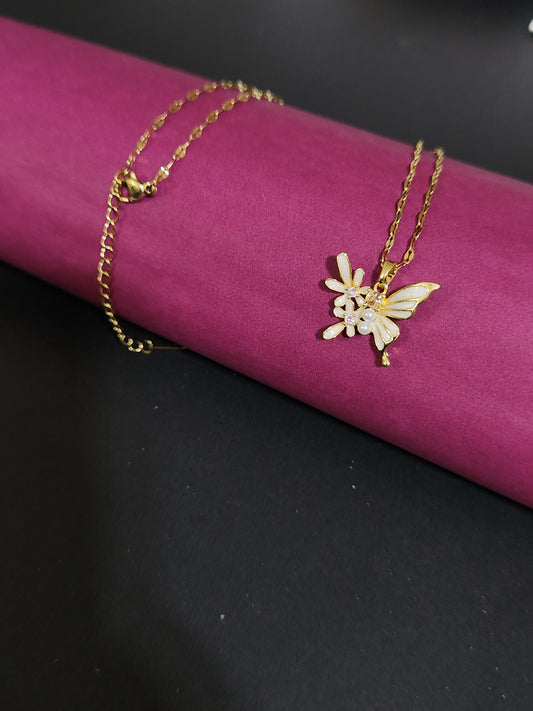 Anti-tarnish butterfly charm necklace with pearl and stone details.