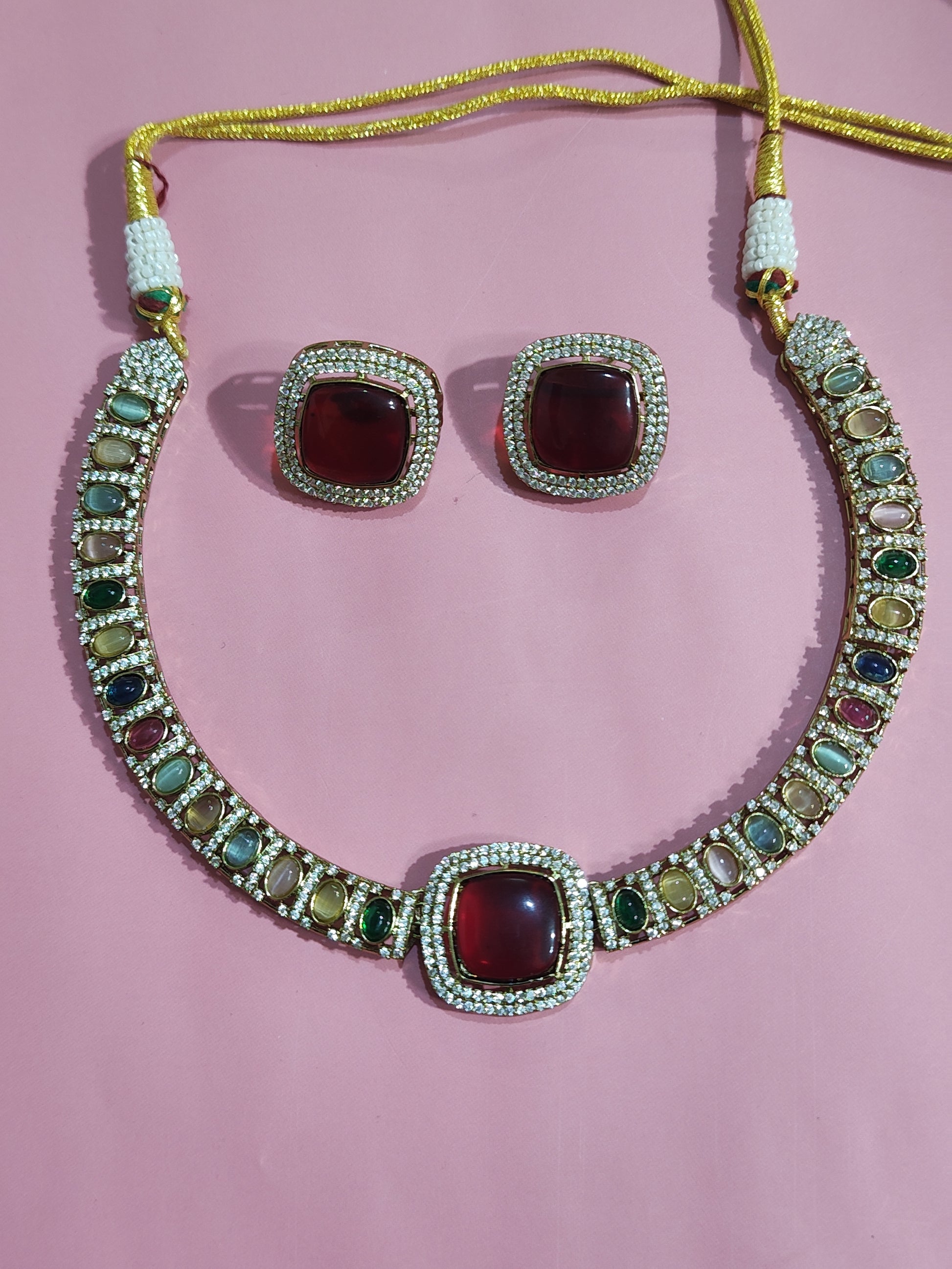 Kundan Hausli Necklace Set with Maroon Stone and Multicolor Work