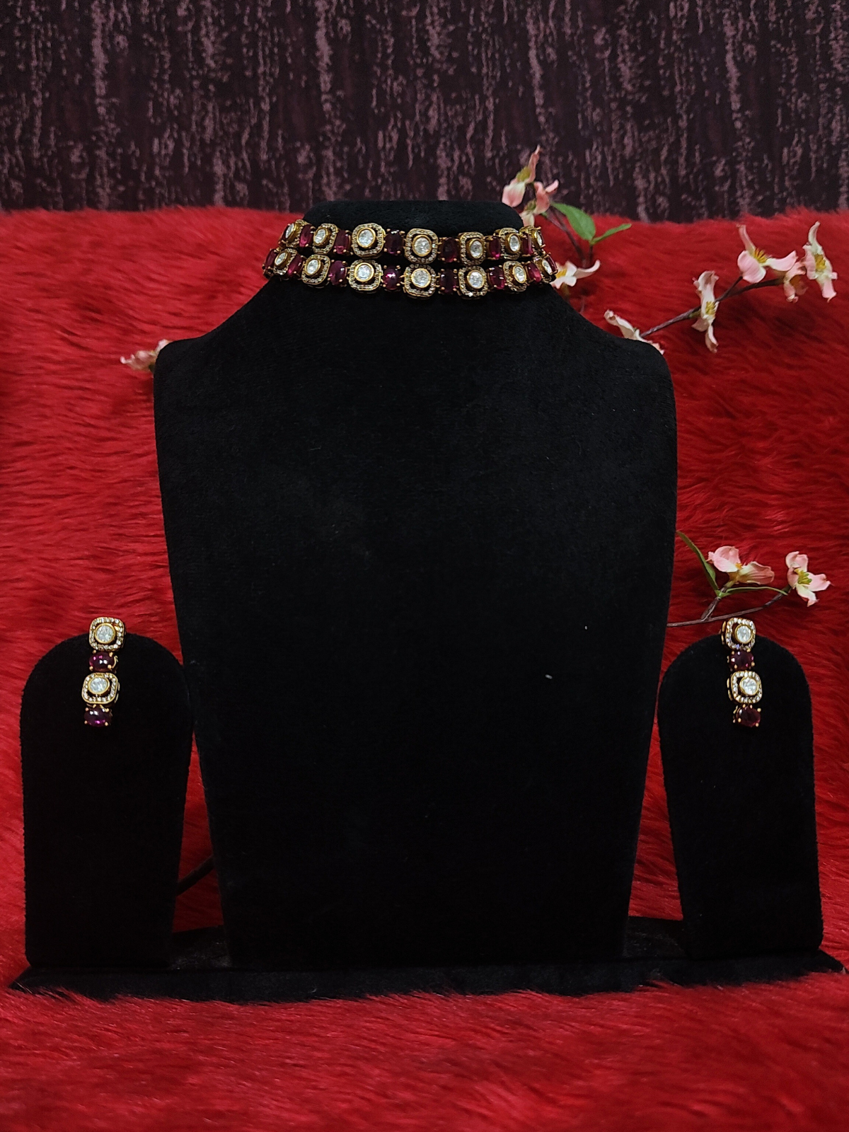 Moissanite choker with maroon pota stones on  dummy