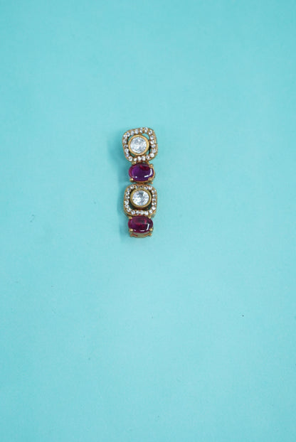 Moissanite maroon earrings pota stones on blue background