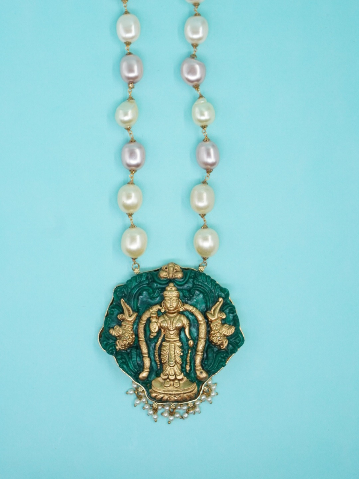 Pearl bead necklace with Lord Venkateswara temple pendant in antique copper and green finish close view