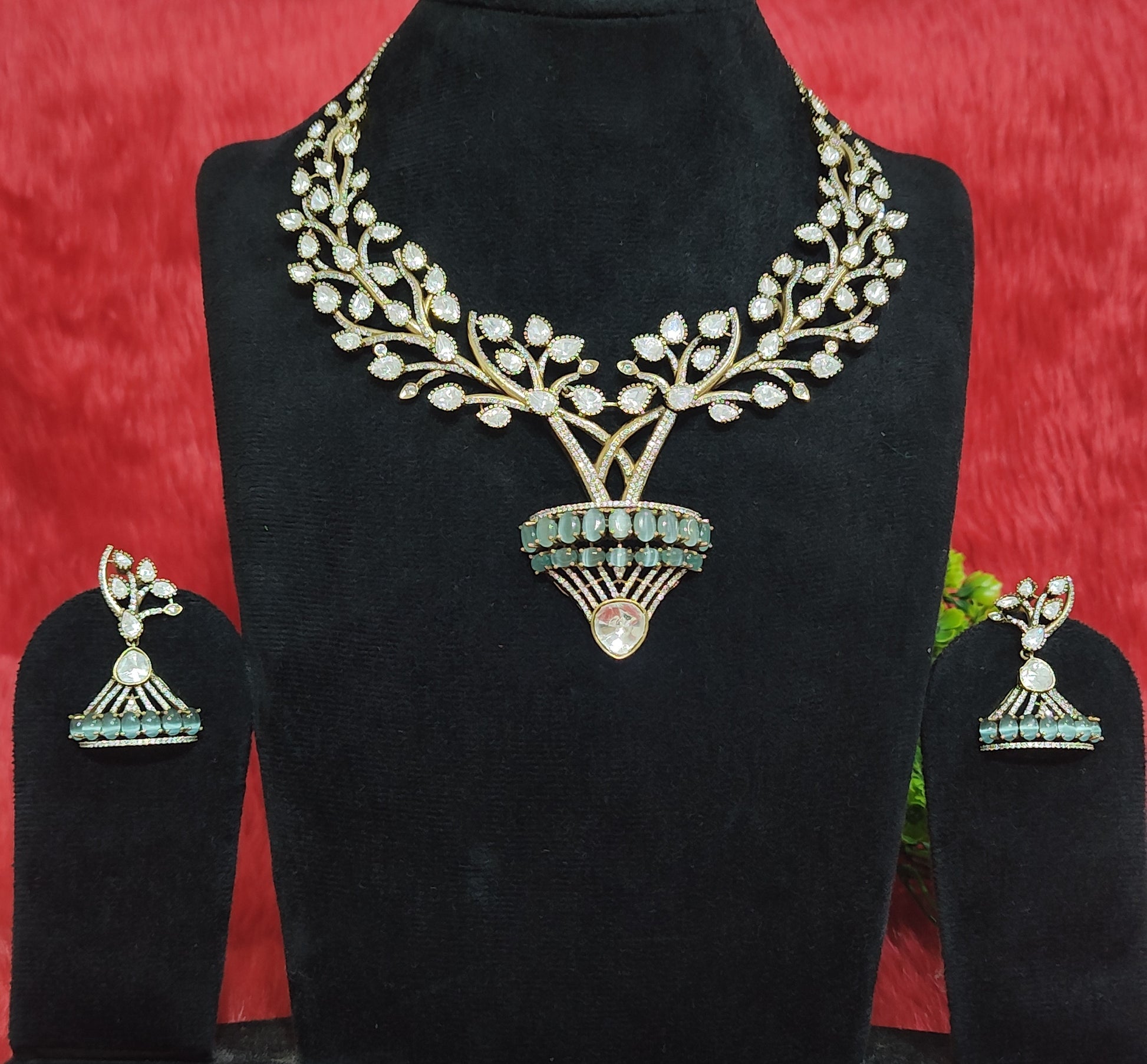 Pemium Pota Doublet Kundan Necklace Set with Leaf Design & Green Beads