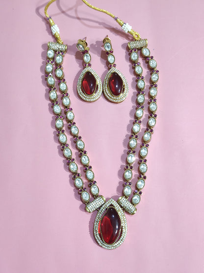 Premium kundan necklace set with twin-layer chain, maroon masonite pendant, and matching earrings displayed close-up