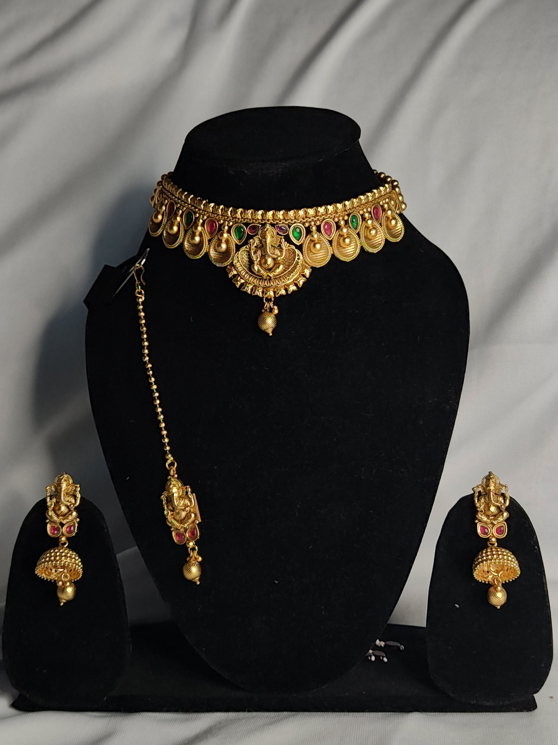 Pure copper Gajanan choker set with coin design, earrings, and maang tikka in antique temple jewellery style