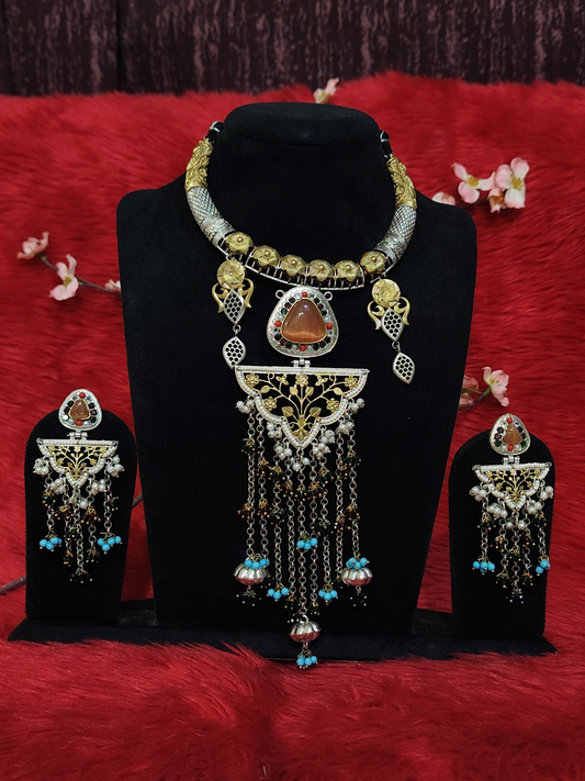 Silver replica necklace with brown stone pendant, hanging beads and matching earrings