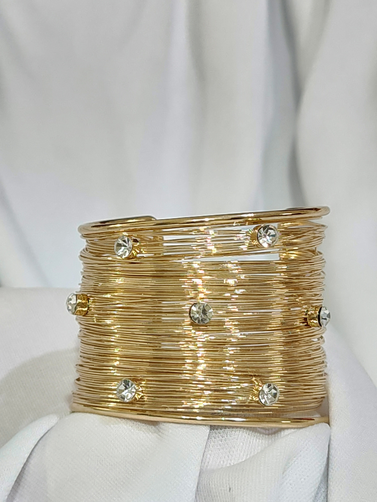Royal anti-tarnish gold finish wide bracelet with stones