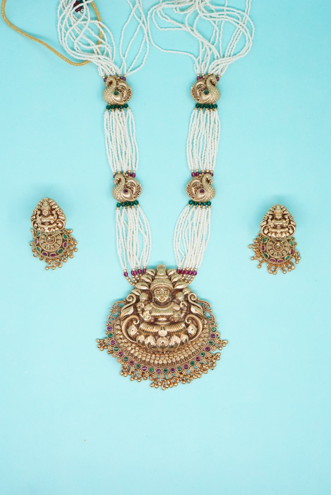 Royal temple haram necklace set in pure copper with Lakshmi pendant and jhumka earrings top view