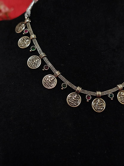 Silver replica coin necklace close view