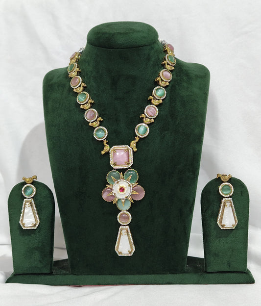 Sabyasachi Neckpiece in Antique Polish with Floral Pendant and Pink and Green Stone