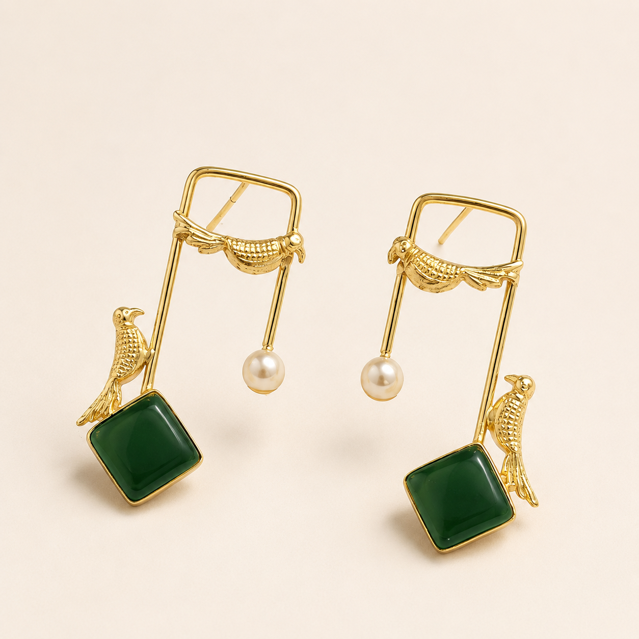 Emerald Green brass bird and artificial pearl statement earrings on ivory