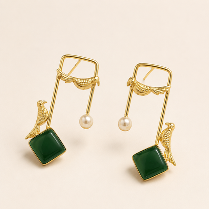Emerald Green brass bird and artificial pearl statement earrings on ivory