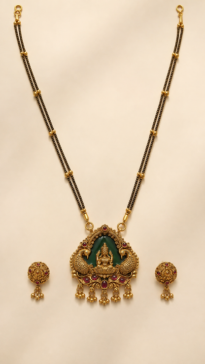 Brass double-line Lakshmi peacock necklace set on ivory background