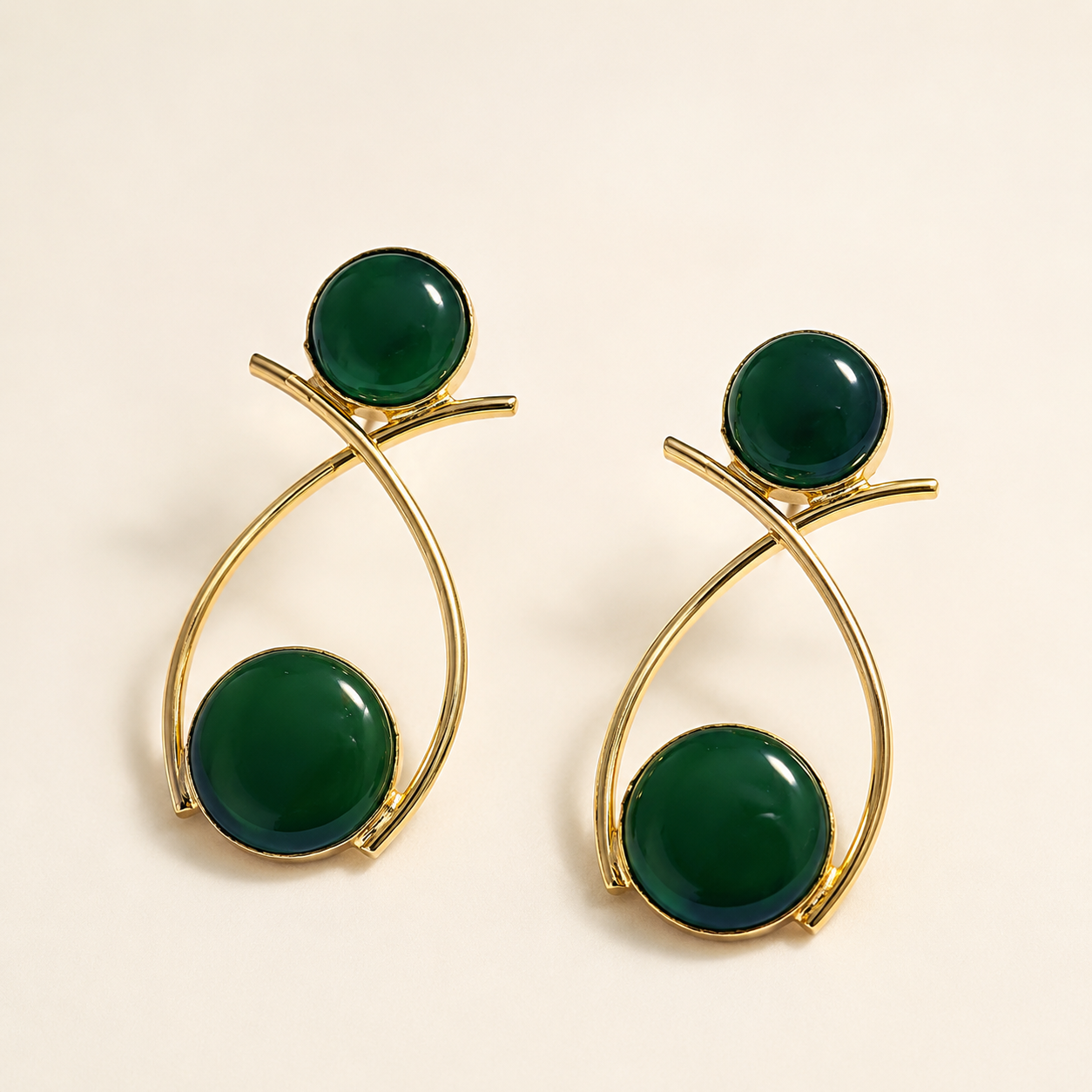 Emerald Green brass double-circle loop earrings on ivory