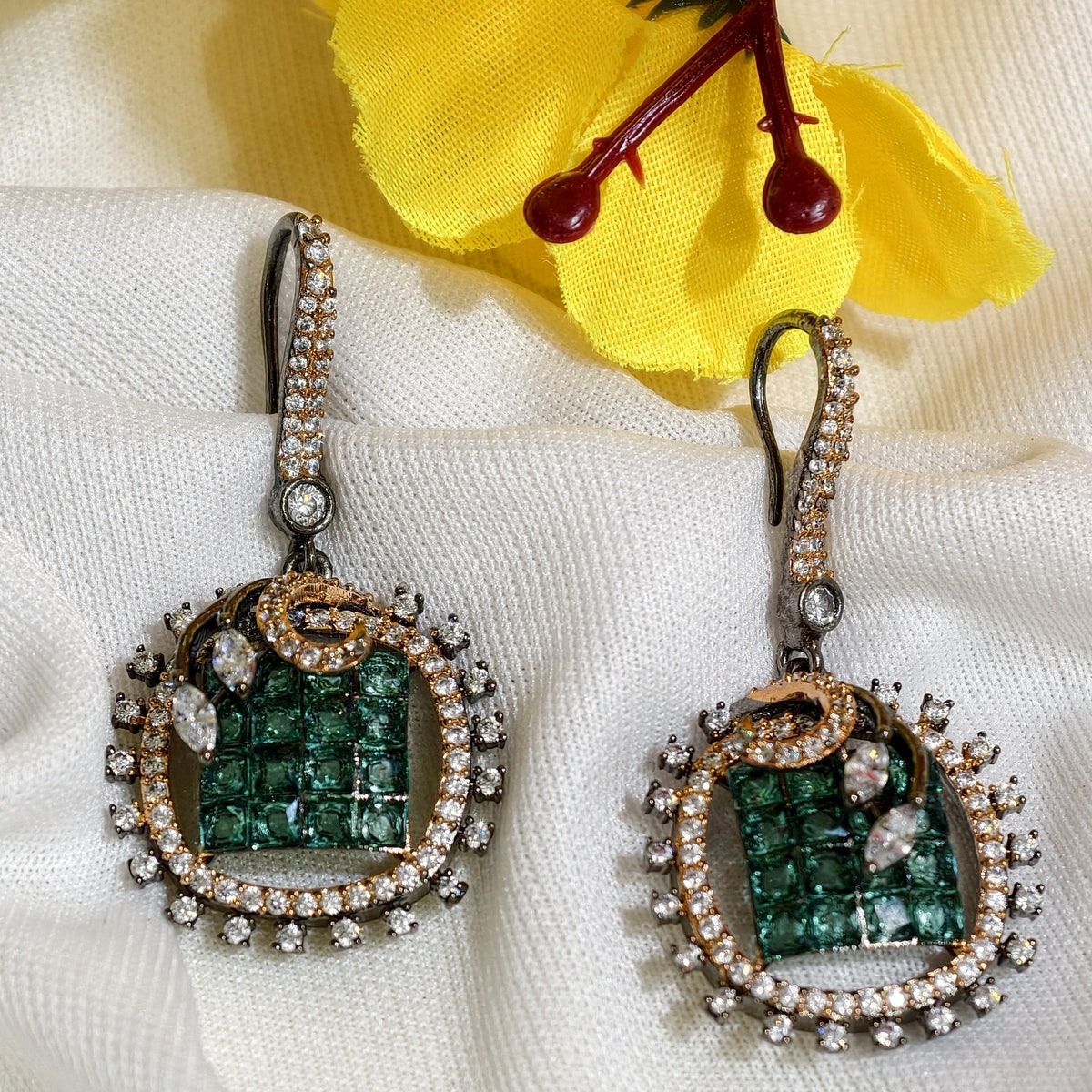 Close-up of Emerald Green Nano Setting AD Square Drop Earrings