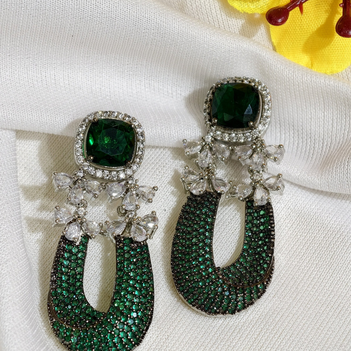 Close-up of Emerald Green Nano Setting AD Statement Drop Earrings