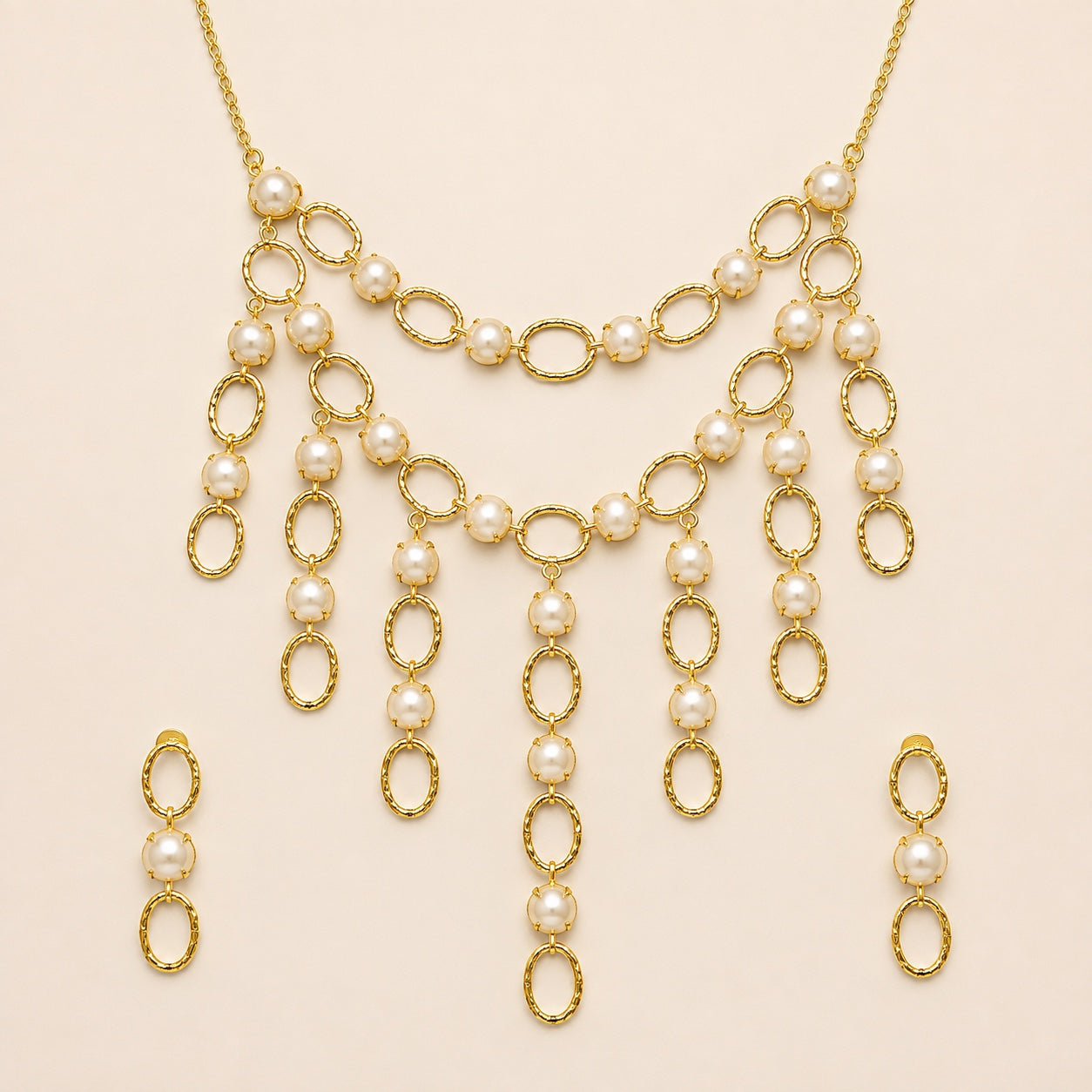 Gold-tone brass oval-link pearl-style necklace set with matching earrings