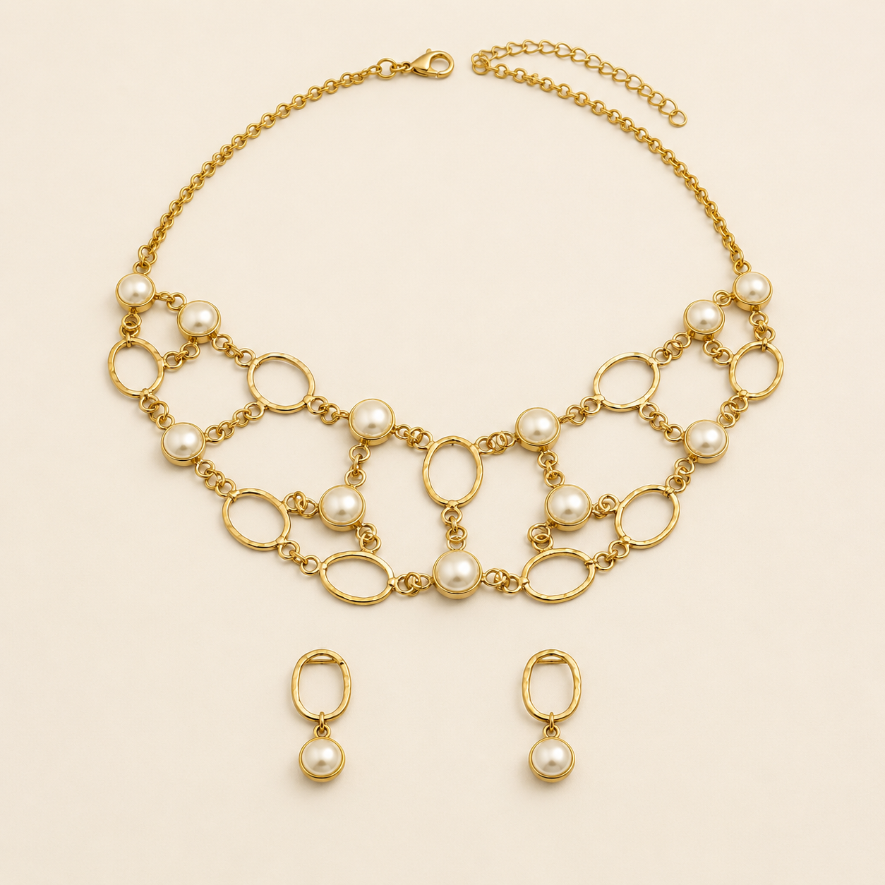 Handmade brass statement necklace with organic links and pearl-style accents flat lay
