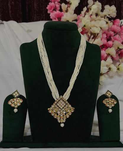 Kundan-style pearl-strand long necklace set with matching earrings