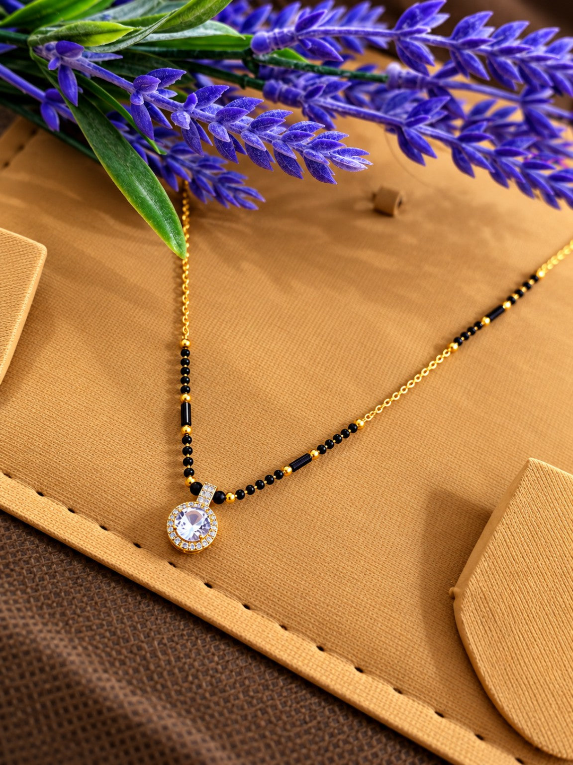 Micro gold-plated black bead mangalsutra with round halo stone pendant