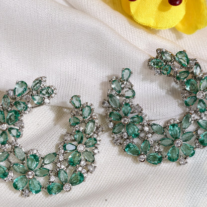 Close-up of Mint Green Nano Setting AD Floral Hoop Earrings