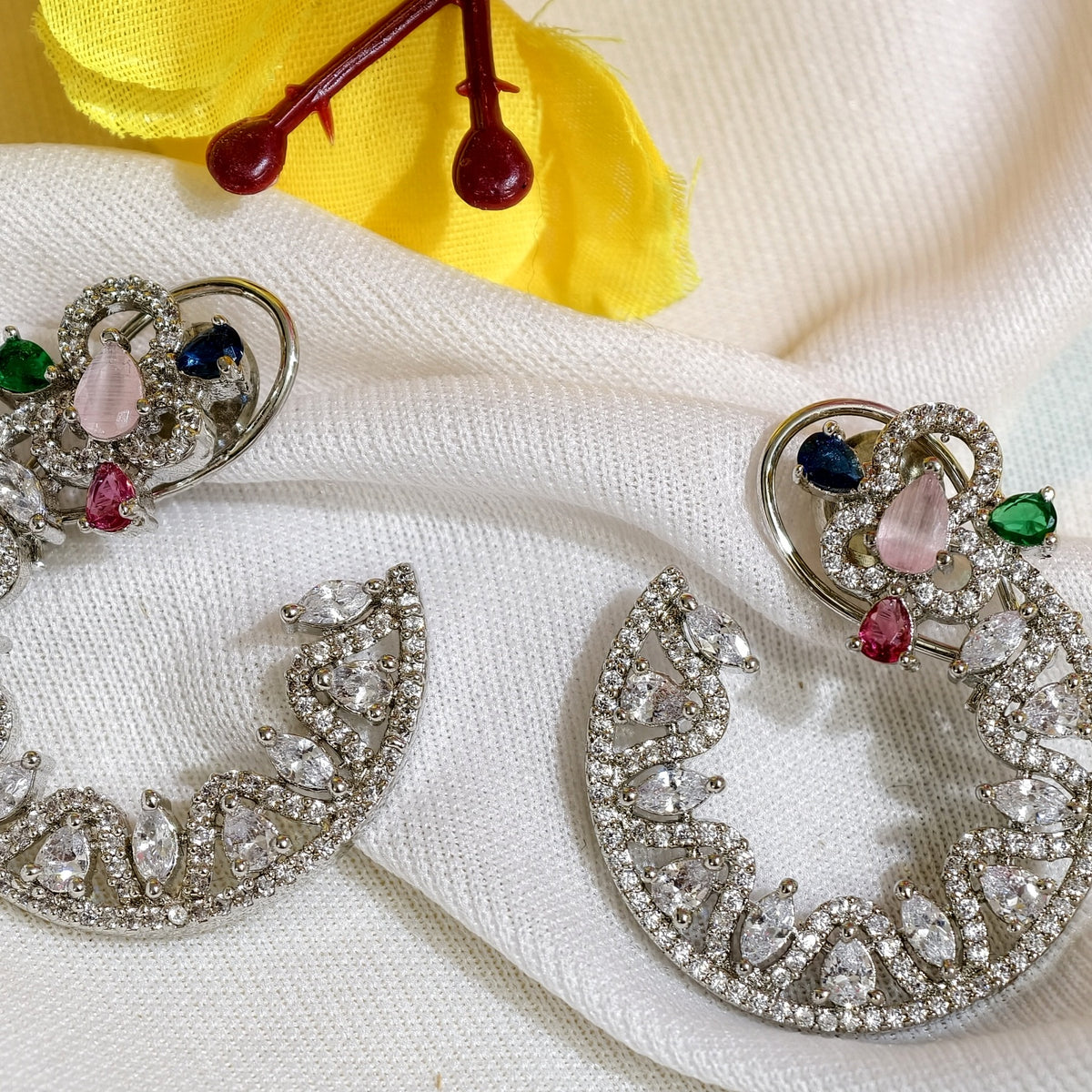 Close-up of Multicolour Nano Setting AD Crescent Hoop Earrings