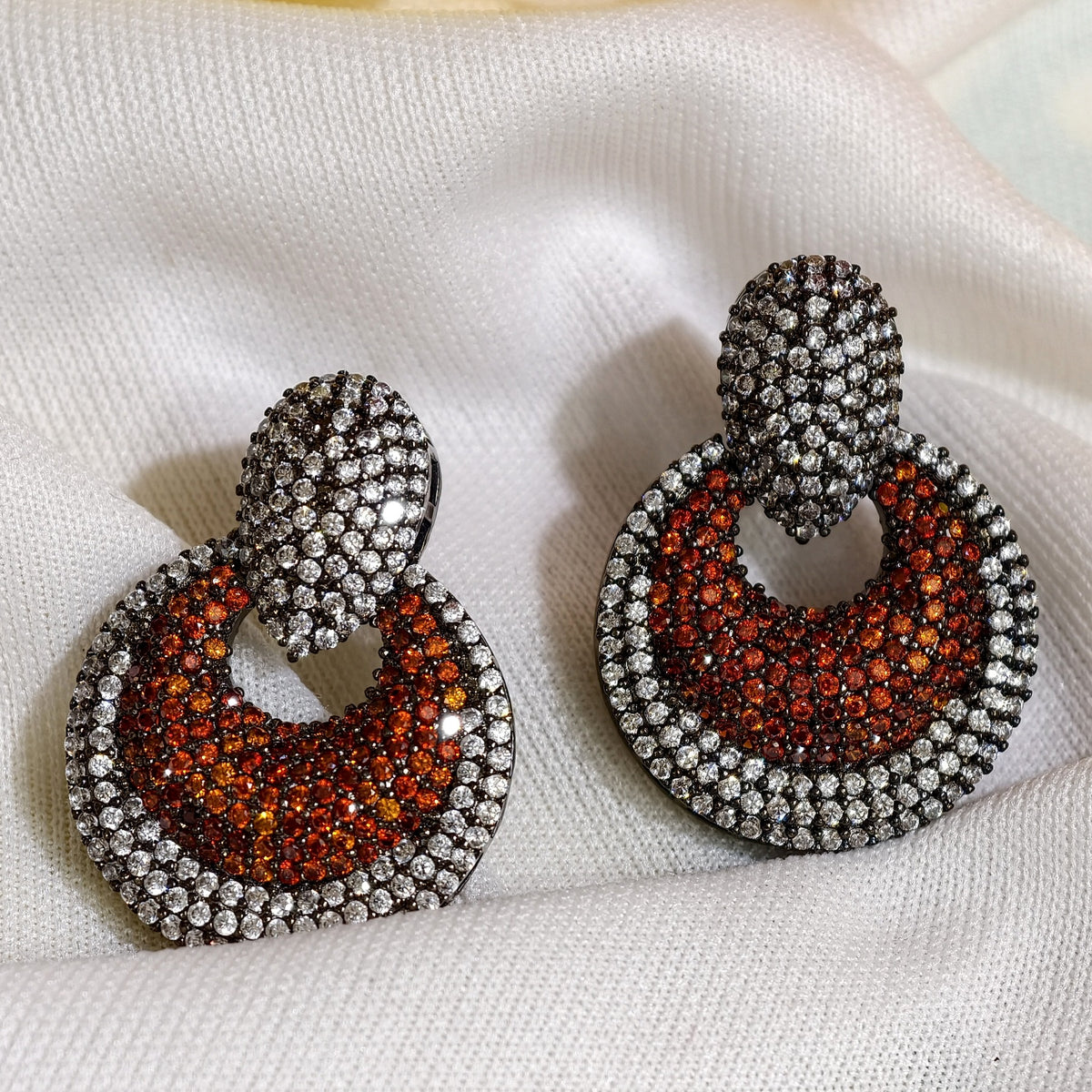Close-up of Orange Nano Setting AD Circular Drop Earrings
