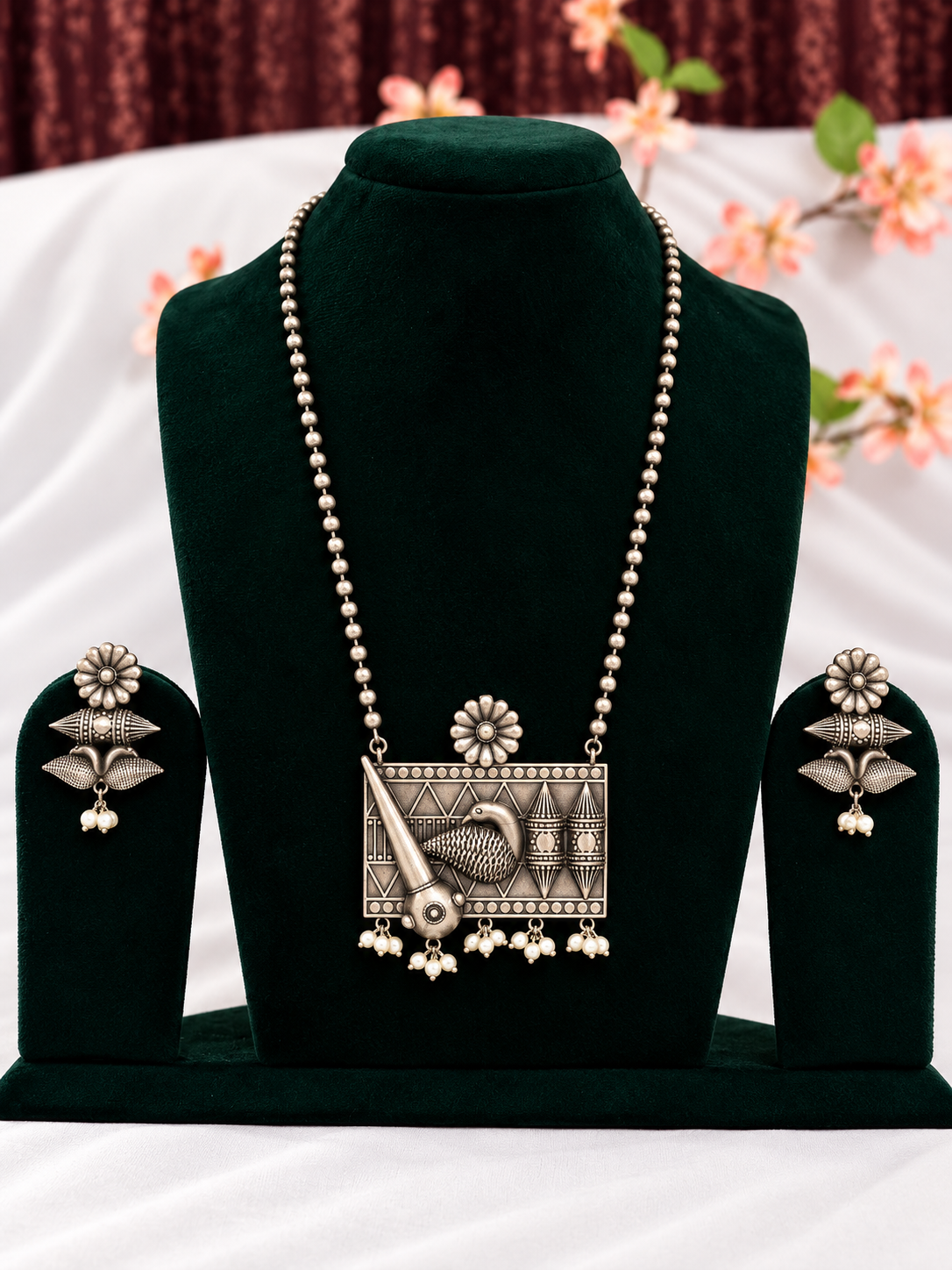 Oxidised silver replica bird motif pendant necklace set with pearl-style drops and matching earrings