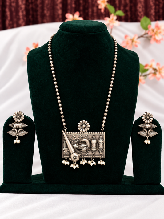 Oxidised silver replica bird motif pendant necklace set with pearl-style drops and matching earrings