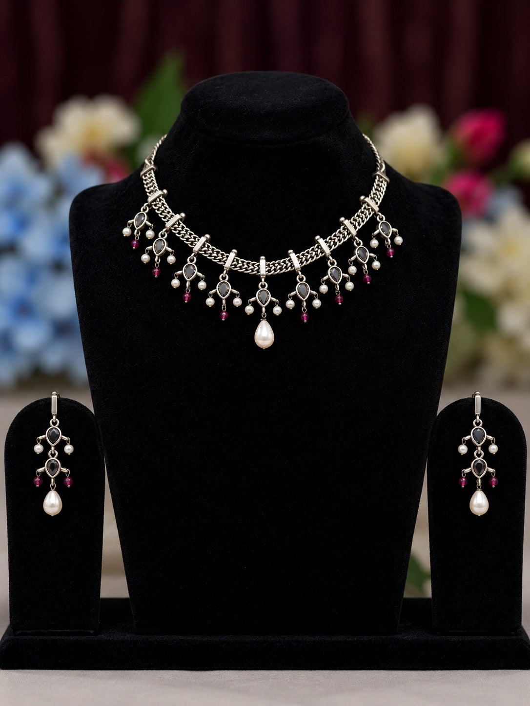 Oxidised silver replica necklace set with black stones, pearl drops and matching earrings