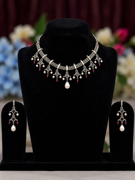 Oxidised silver replica necklace set with black stones, pearl drops and matching earrings