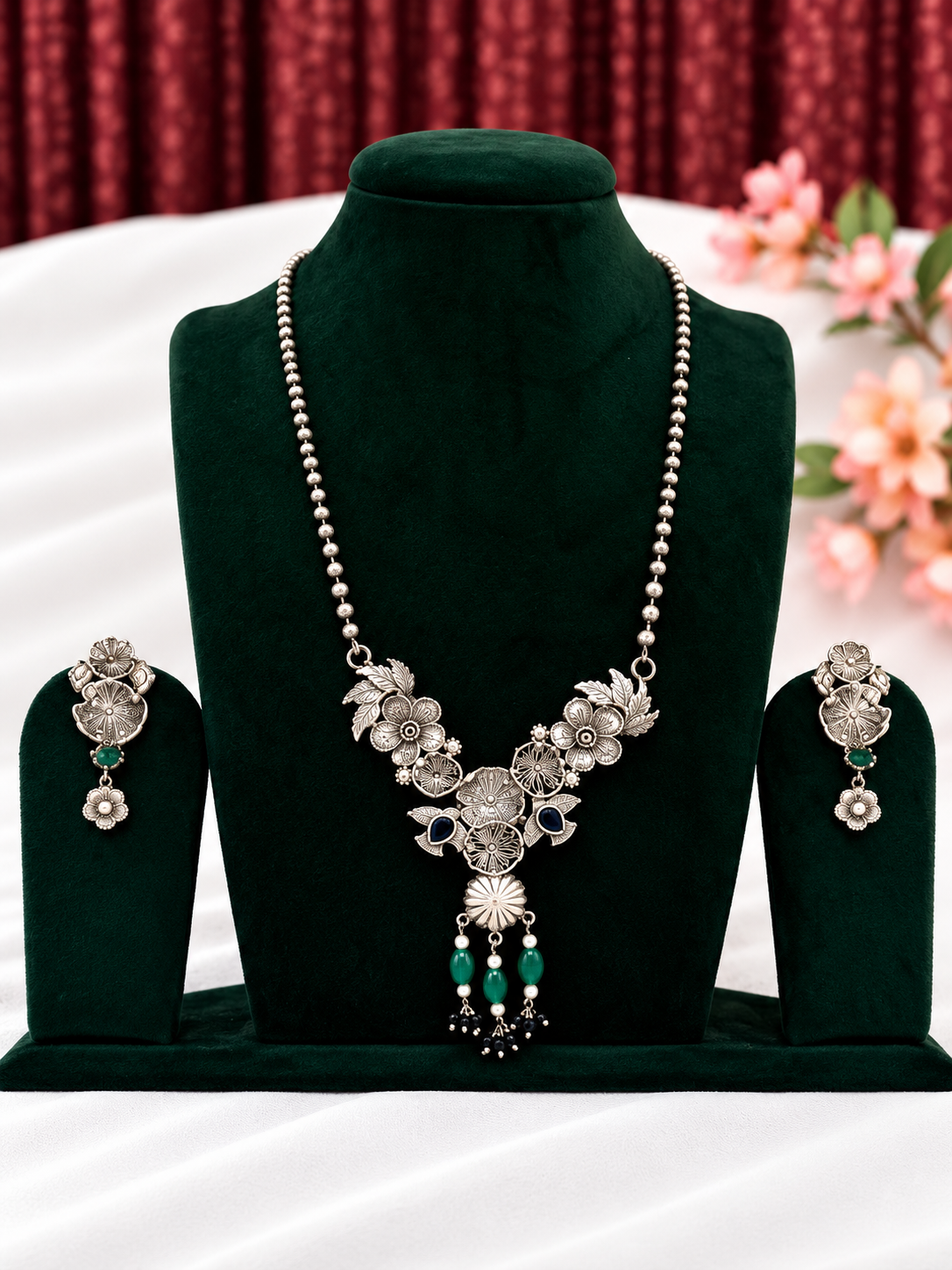 Oxidised silver replica floral vine necklace set with green bead drops and matching earrings