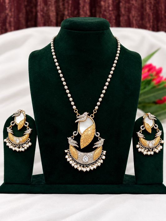 Oxidised silver replica two-tone peacock pendant necklace set with pearl-style drops and matching earrings