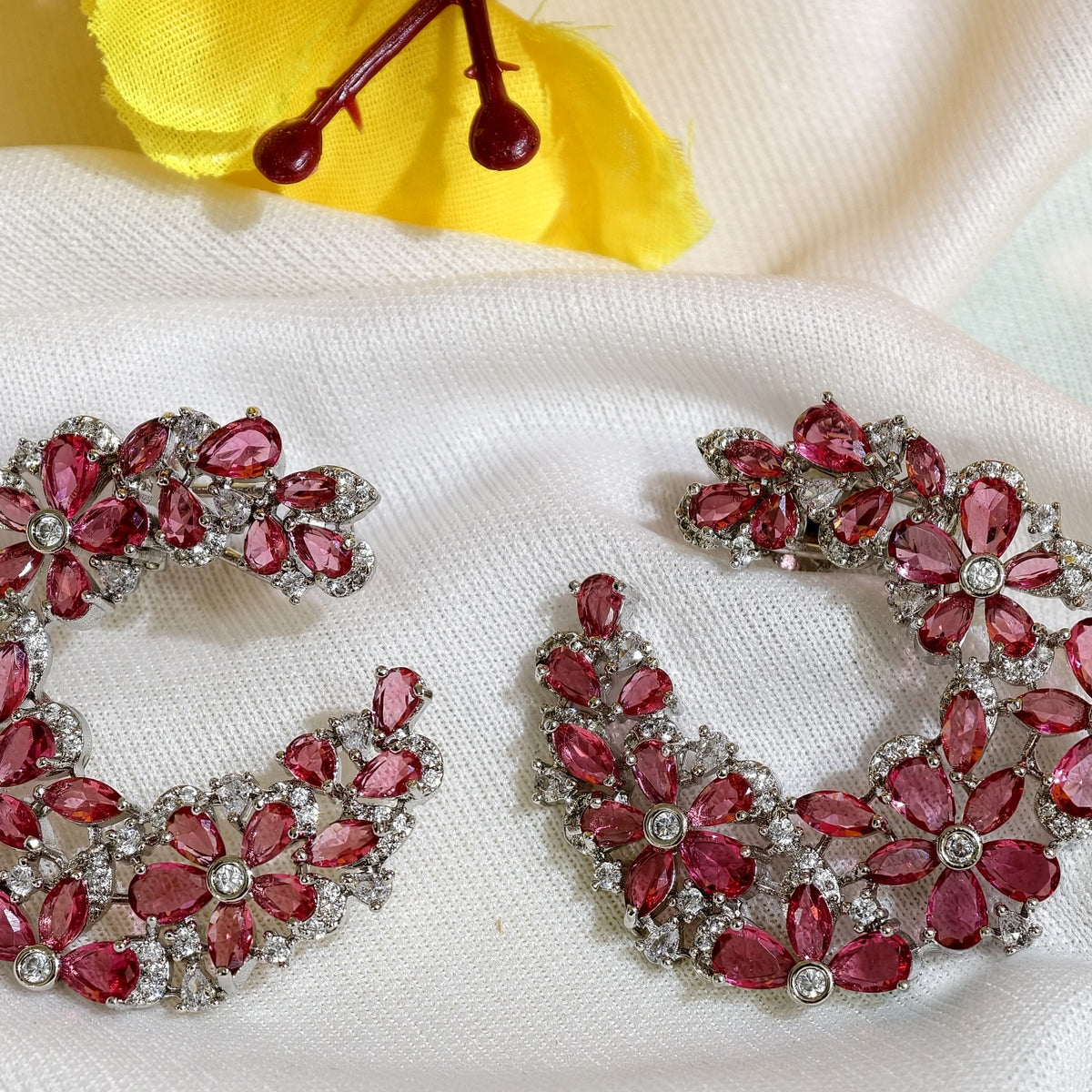 Close-up of Pink Nano Setting AD Floral Hoop Earrings
